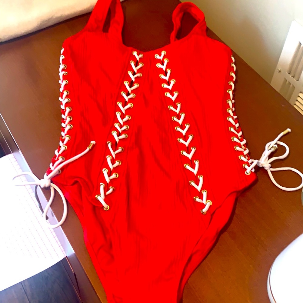 Red bathing suit with white lace